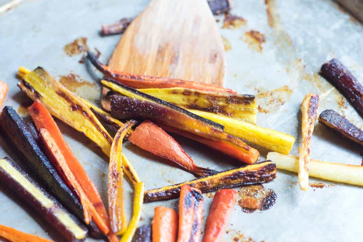 How to Make Honey Roasted Carrots with Tahini Sauce: Carrots that have been roasted until browned and tender