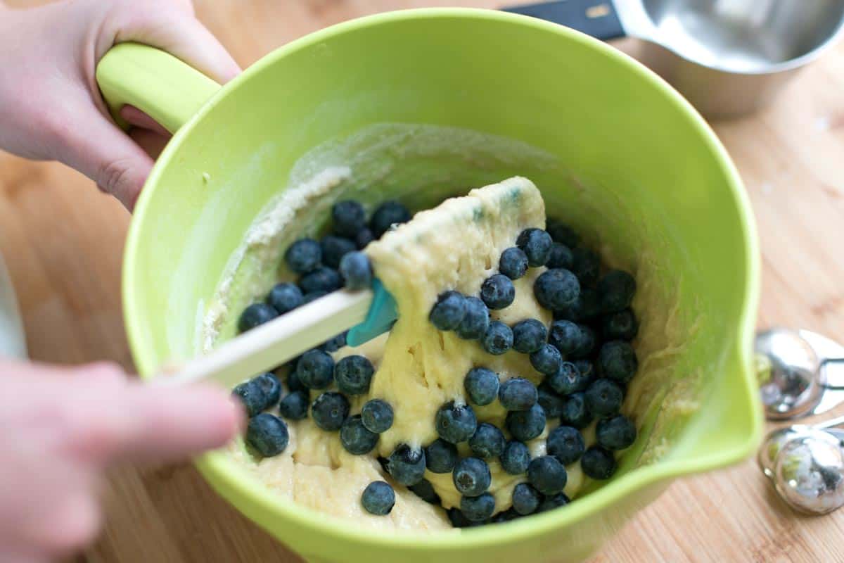 How to make blueberry muffins - mixing our easy blueberry muffin batter with blueberries