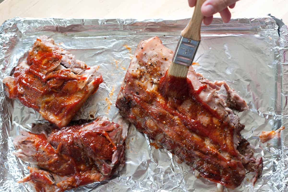Brushing the Sauce onto the Baked Ribs
