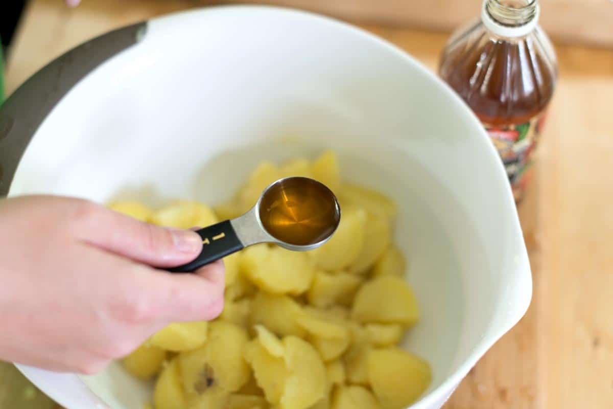 Tossing potatoes with vinegar so they taste amazing (a potato salad secret)