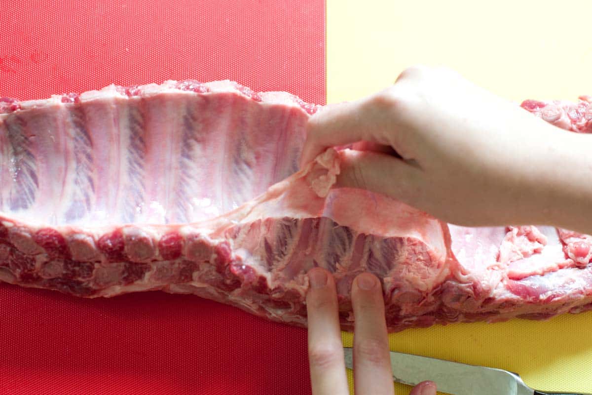 Removing the membrane for tender ribs