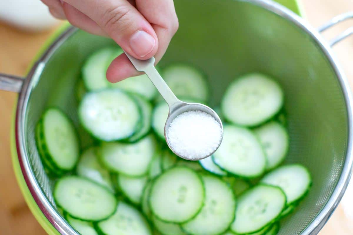 How to Make Vinegar Cucumber Salad: Salting the cucumbers