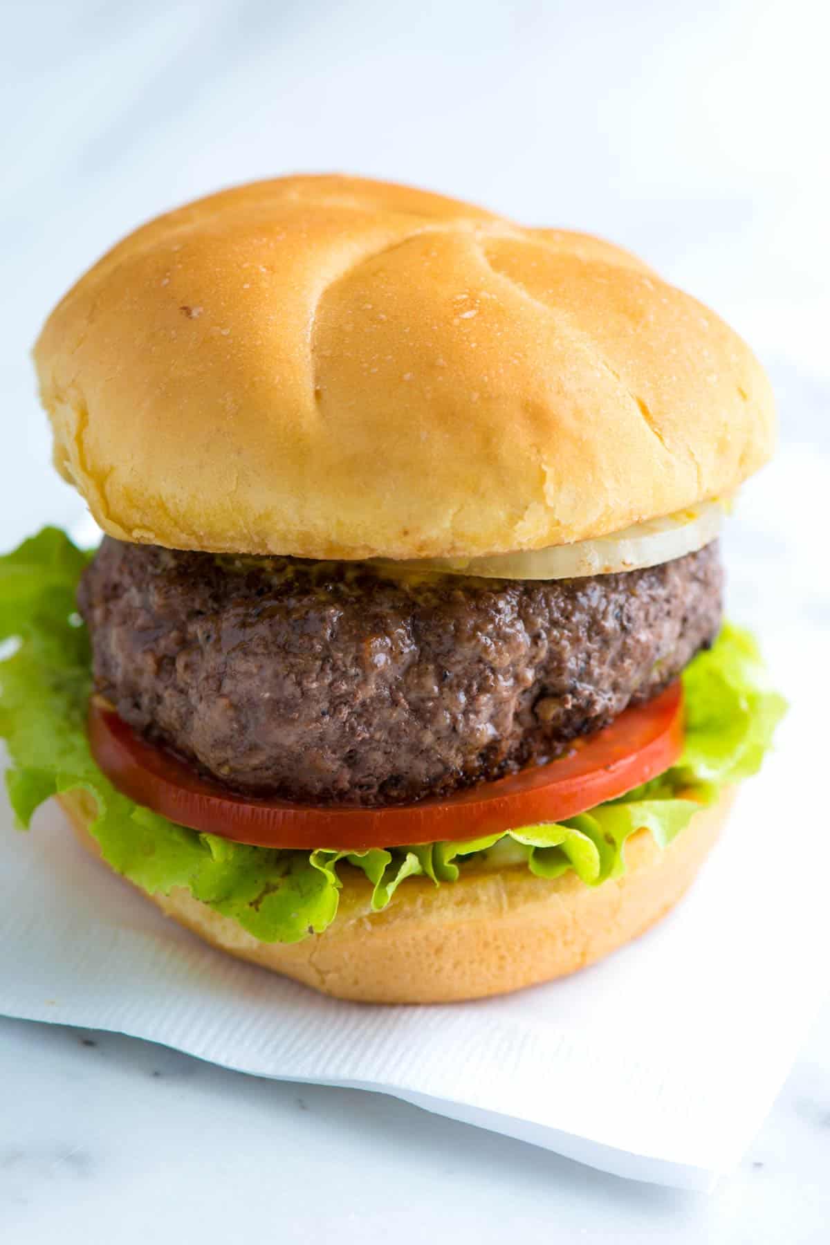 Is a plain burger (just buns and meat) healthier than one with