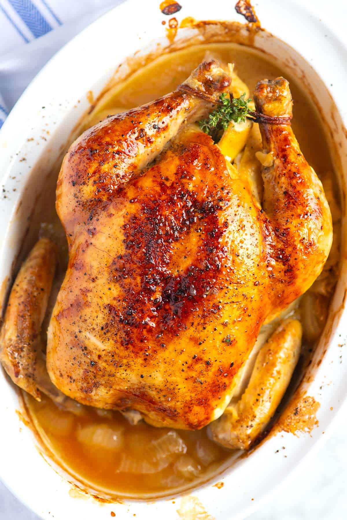 Simple Whole Roasted Chicken with Lemon - The Secret Saucer