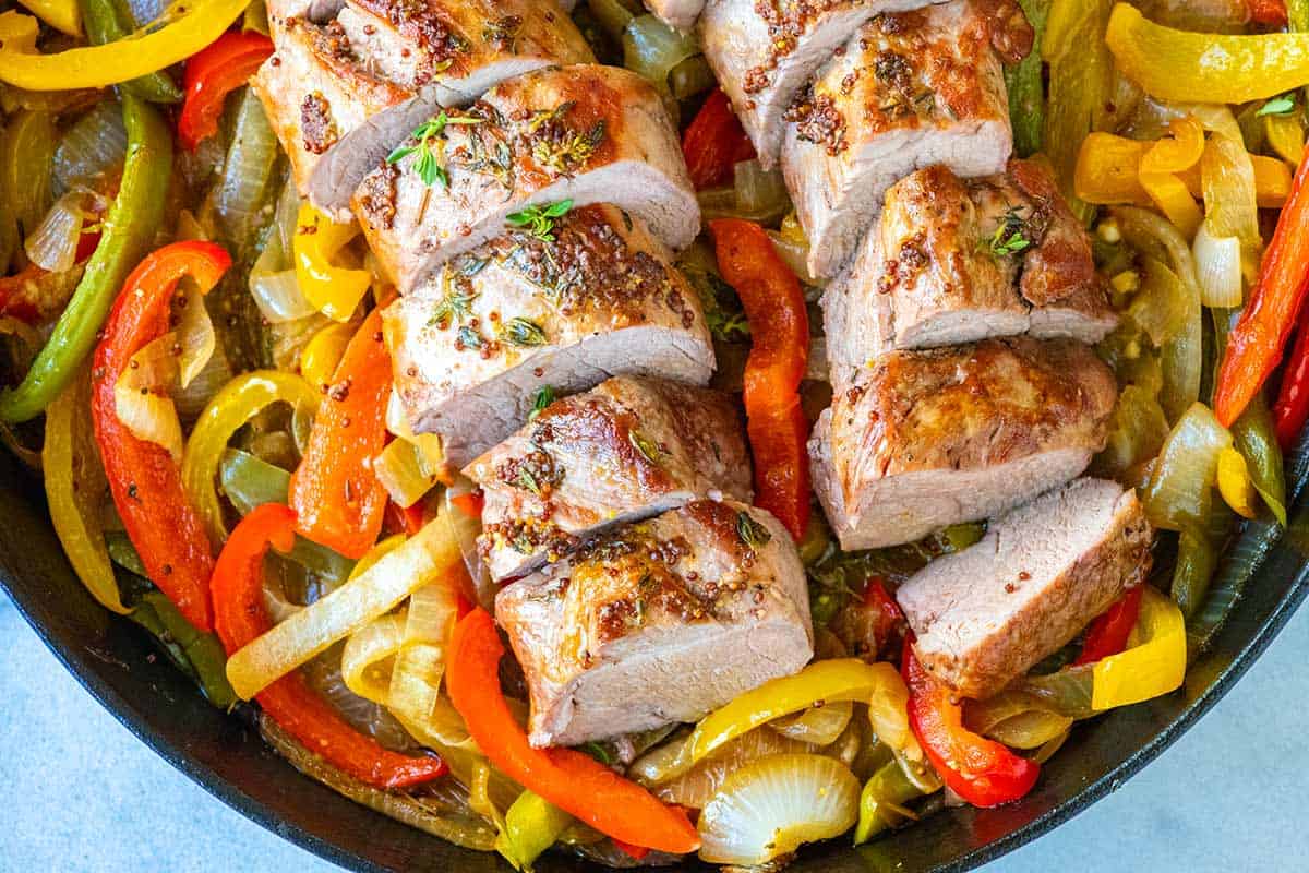 Juicy Pork Tenderloin With Peppers And Onions