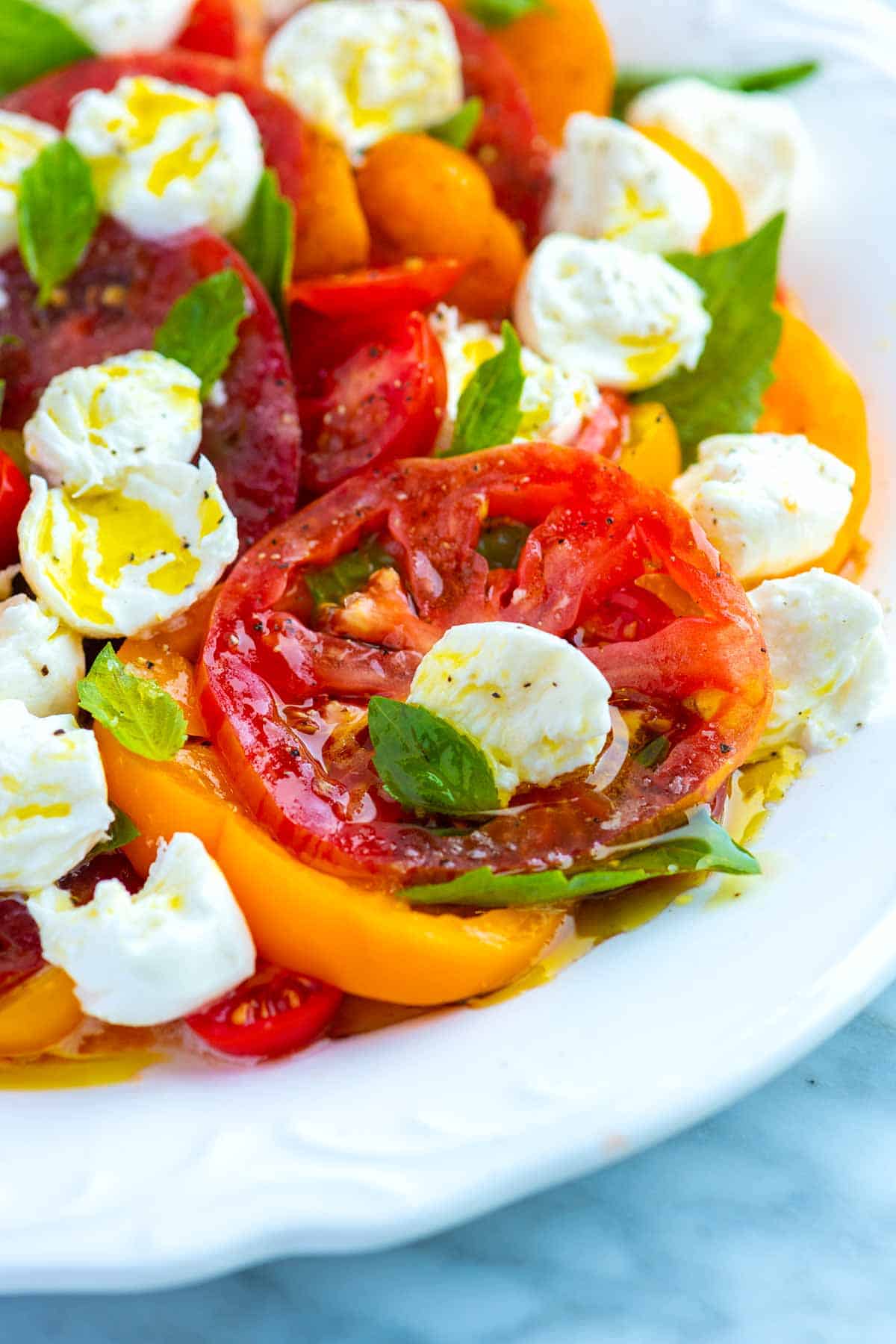 Delicious Caprese Salad with Fresh Tomatoes and Mozzarella