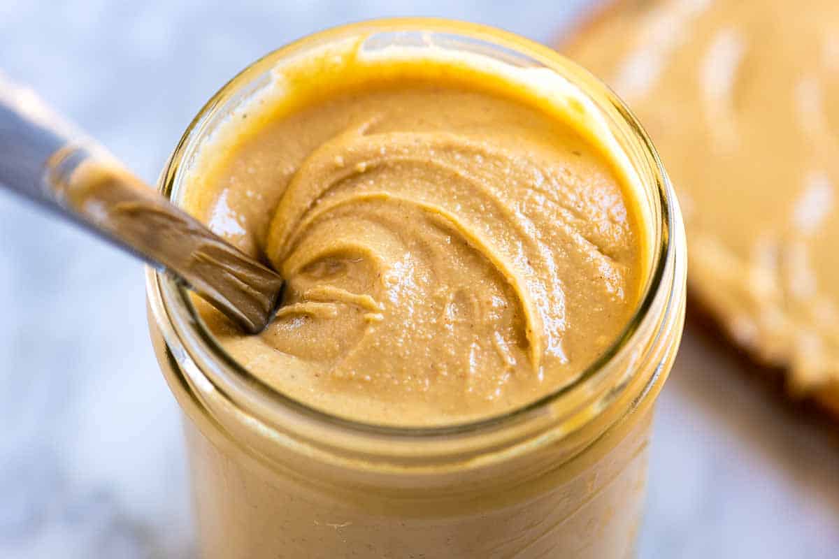 Homemade cashew butter in a jar ready to store.