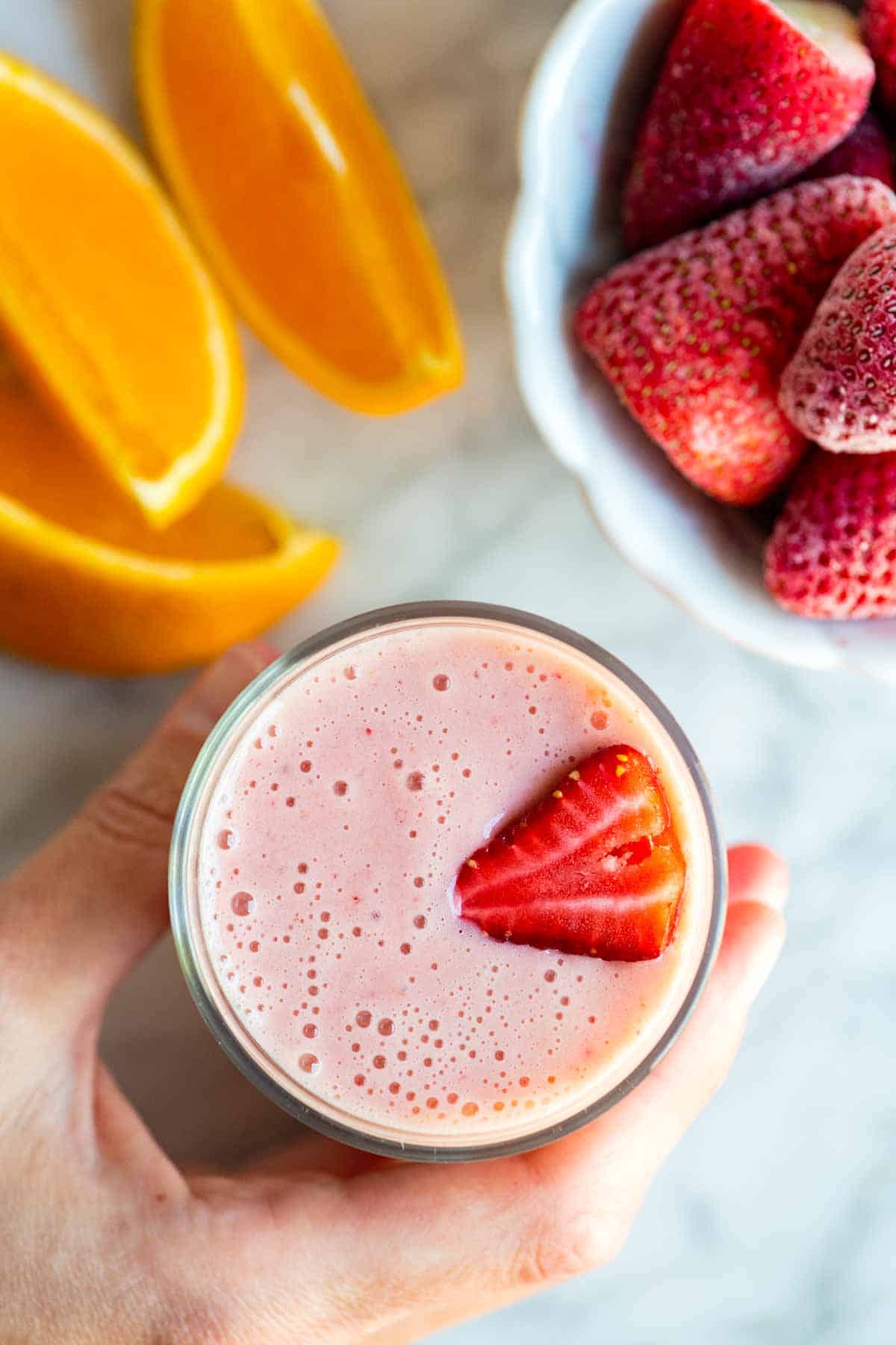 Creamy pineapple and strawberry breakfast smoothies - Simply Delicious