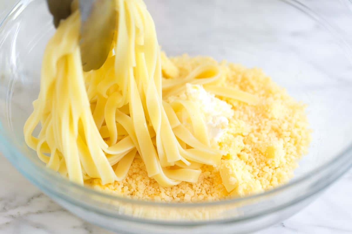 How to make fettuccine Alfredo with butter, parmesan, and cooked fettuccine