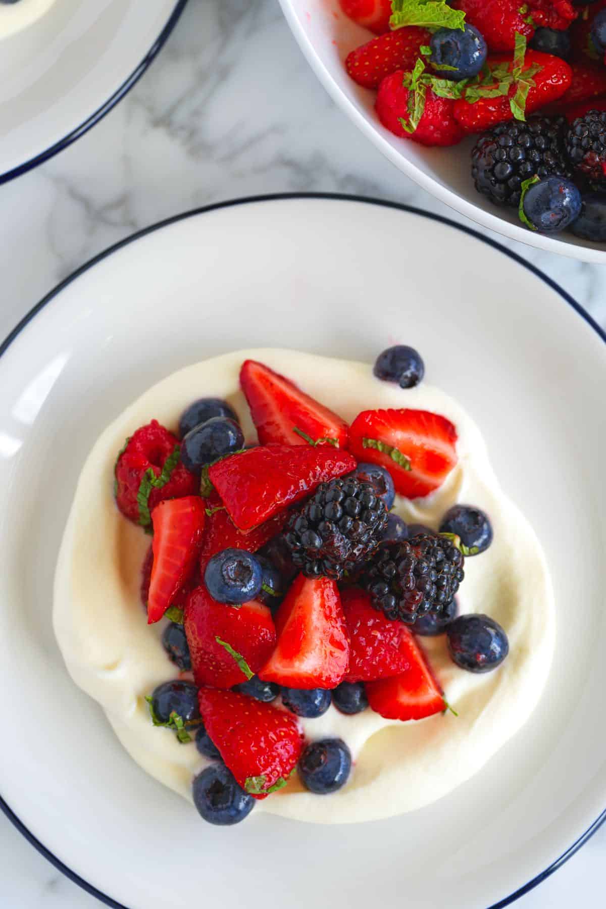 Berry Fruit Salad -- A plate with berries and cream