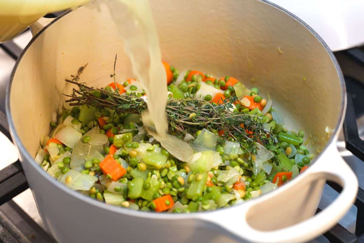 How to Make Split Pea Soup: Adding the broth